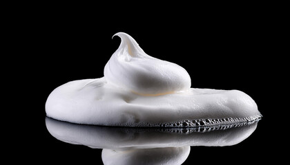 Closeup of shaving cream on a black background