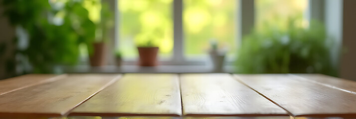 Aufkleber - An empty wooden tabletop is reflected in a blurred green garden scene from the kitchen window in the morning._00001_