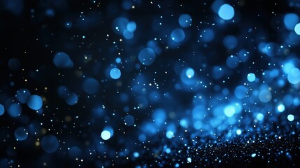 Wall Mural - Blue bokeh particles with sparkles on dark background. Magic celebration concept