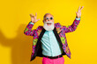 © deagreez - Photo portrait of nice senior male dancing star sunglass wear trendy colorful pink fancy outfit isolated on yellow color background