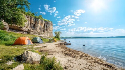 Wall Mural - Captivating lakeside camping adventure with vibrant tents nestled near the water s edge surrounded by towering cliffs and clear blue skies offering a peaceful and serene natural getaway