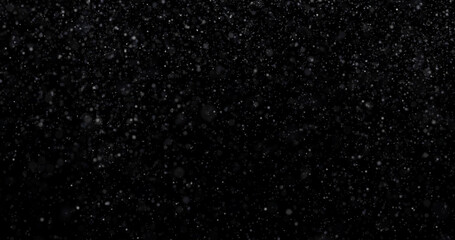 Wall Mural - Natural white winter snowfall on a black background 3d rendering