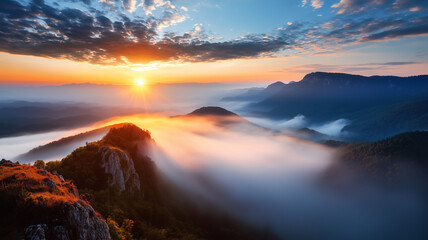Aufkleber - breathtaking sunrise illuminates mystical fog rolling over serene valley