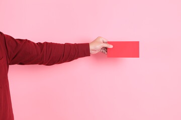 Wall Mural - hand holding Red envelopes