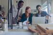 © Geber86 - Young people working on a project together in a startup company office
