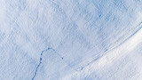 Aerial View of Snow-Covered Ground in Minimalist Winter Landscape