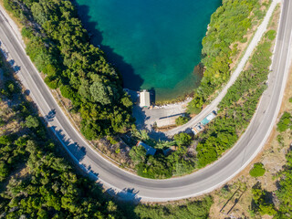 Wall Mural - Winding road by the lake