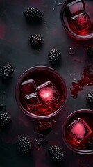 Wall Mural - Refreshing cocktails with blackberries and ice served on a dark surface