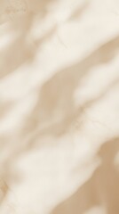 Poster - Soft sunlight creates intriguing shadows on a neutral beige marble background, offering a calming and elegant backdrop perfect for showcasing products or adding a touch of sophistication