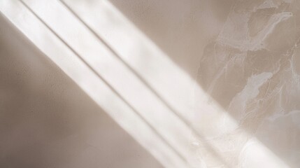 Poster - Bright sunlight is streaming through a window, creating diagonal shadows on a textured wall, adding depth and interest to the neutral-toned background