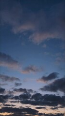Sunset clouds on beautiful dramatic blue skybackground. Weather, time and heaven concepts