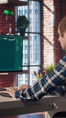 Fototapete - Person at home getting tasks done with AI program turning text prompt into videos. Man using computer to make use of text to video artificial intelligence generative models, camera A