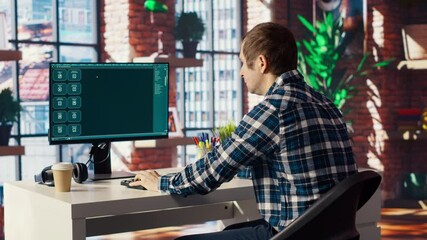 Fototapete - man seated at desk using ai llm chatbot software in modern urban home office. person requesting help