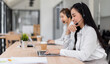 © David - Asian call center team, customer service, telesales wearing headset or headphone talking with customer in the office. Customer Service Representative, Service, Call Center,