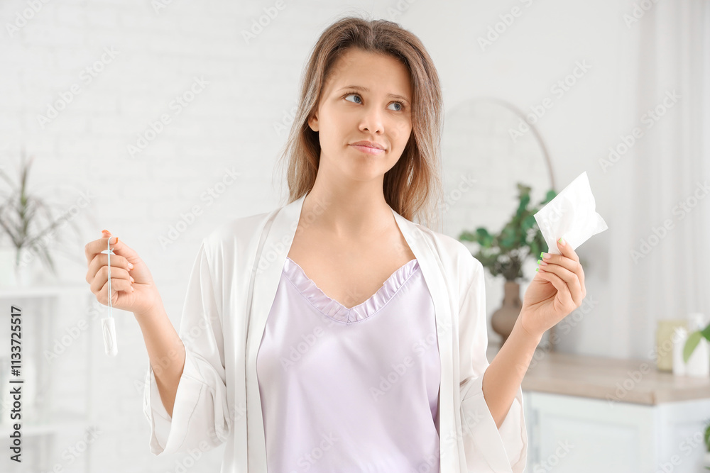 Young woman in bathroom