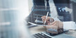 © tippapatt - Business data analytics, plan and financial report concept. Businessman using KPI dashboard with data analytics graph, business growth and digital marketing plan, market research