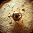 © ikksajaa - Close-up of a metallic atom model resting on aged scientific papers.