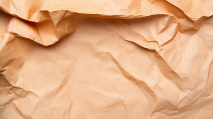 Poster - Brown, wrinkled paper exhibits various textures and shades perfect for design projects, crafting, or as a backdrop for presentations