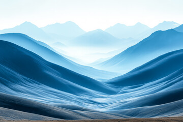 serene blue mountain landscape with layered hills under soft light during dawn
