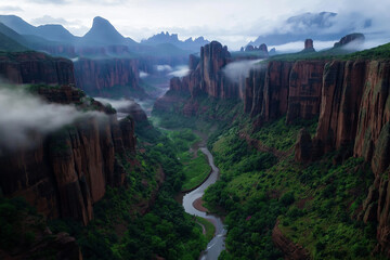 Poster - A misty canyon with a winding river flowing through layers of jagged rock formations