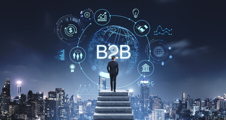 Poster - Businessman standing on steps overlooking city skyline with glow