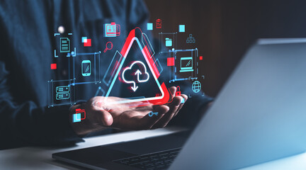 Poster - Hands holding glowing triangular cloud icon with digital icons on dark background.