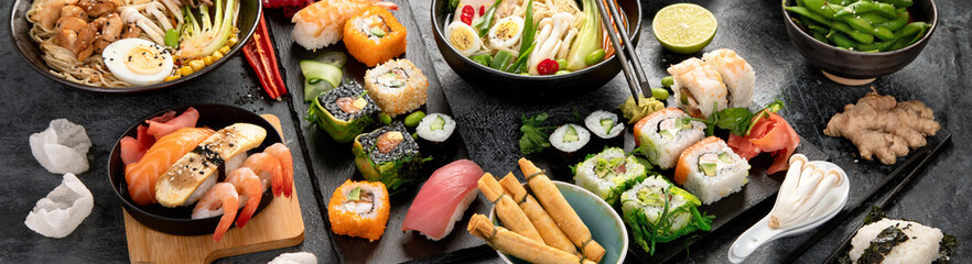 Wall Mural - Japanese dishes and snacks on gray background.