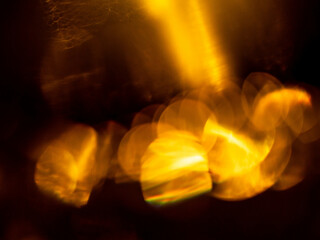 Wall Mural - abstract bokeh background with warm color. digital background for design. lens flare and light glow.