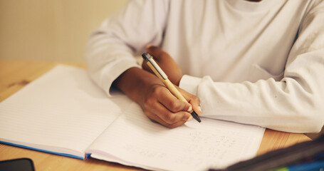 Aufkleber - Hands, writing and child with notebook, desk and education for student, growth and development in school. Table, pupil and kid with assessment, closeup and youth with scholarship in classroom