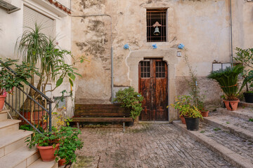Naklejka na meble The facade of a small church among the alleys of Maranola, a small medieval town in the municipality of Formia, Italy.