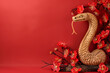 © Duckai - Copy Space of a Wooden Snake Handicraft Figure on Plain Red Background Representing 2025 Lunar New Year and Eastern Culture Symbol