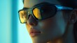 © Andrii Savchuk - Side profile of a woman in sleek black futuristic sunglasses