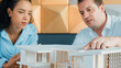 © Summit Art Creations - Professional architect engineer team discuss about house model construction. Skilled project manager brainstorming about house material and structure problems. Business design concept. Manipulator.