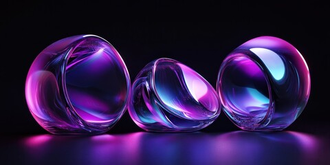 Three glass balls with purple and blue neon lights on black background.