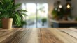 © Vikarest - Wood table top with green plants on blur kitchen counter (room)background.