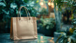 © MK studio - A clean kraft paper shopping bag elegantly rests on a surface surrounded by lush greenery, showcasing a perfect mockup for eco-friendly packaging designs