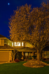 Wall Mural - Entrance of luxury house with nice green Summer landscape at night in Vancouver, Canada, North America. June 2024.