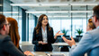 © Nika - Engaging Dialogue in a Contemporary Workspace A formal presentation unfolds in a sunlit office, fostering collaboration amidst greenery and modern design.