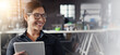 © peopleimages.com - Thinking, tablet and smile with business woman in office for reflection, networking and planning. Banner, opportunity and professional with person in agency for connection, schedule and research