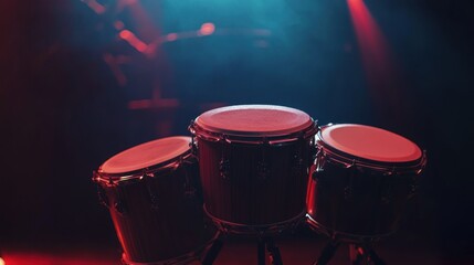 Poster - Three drums, stage lighting.