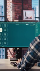 Fototapete - Man in home office using generative artificial intelligence website generating videos using diffusion models. Person wearing headphones using AI virtual assistant producing clips for him, camera A