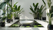© atex - Modern minimalist bathroom with indoor plants and water feature.