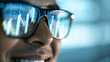 © Netaya - Smiling Businessman Face with Financial Charts Reflected in Glasses Symbolizing Optimistic Growth