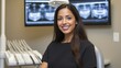 © Vasiliy - Woman in black uniform near dental chair with xrays. Professional dentistry concept