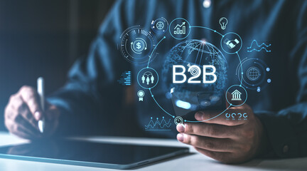 Poster - digital b2b technology concept with icons and businessman holding mobile device and stylus on a blur