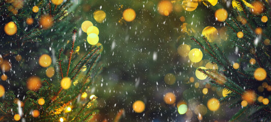 Wall Mural - merry christmas and happy new year background, close up, elegant christmas tree on blurred snowfall 