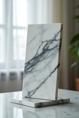 Poster - A marble display is shown in a blurred background created by a window curtain._00002_