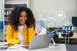 © NINENII - Learning online working concept. Businesswoman working on tablet and laptop computer, searching working in office.