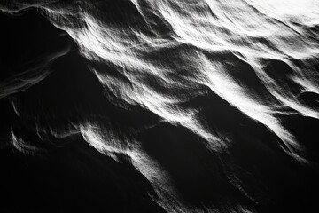 Aufkleber - Soft shadows dance across a textured surface, creating contrasting patterns of light and dark