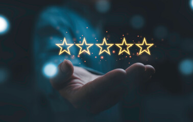 Poster - Businessman holding glow  golden five stars for customer excellent satisfaction and product service evaluation award concept.